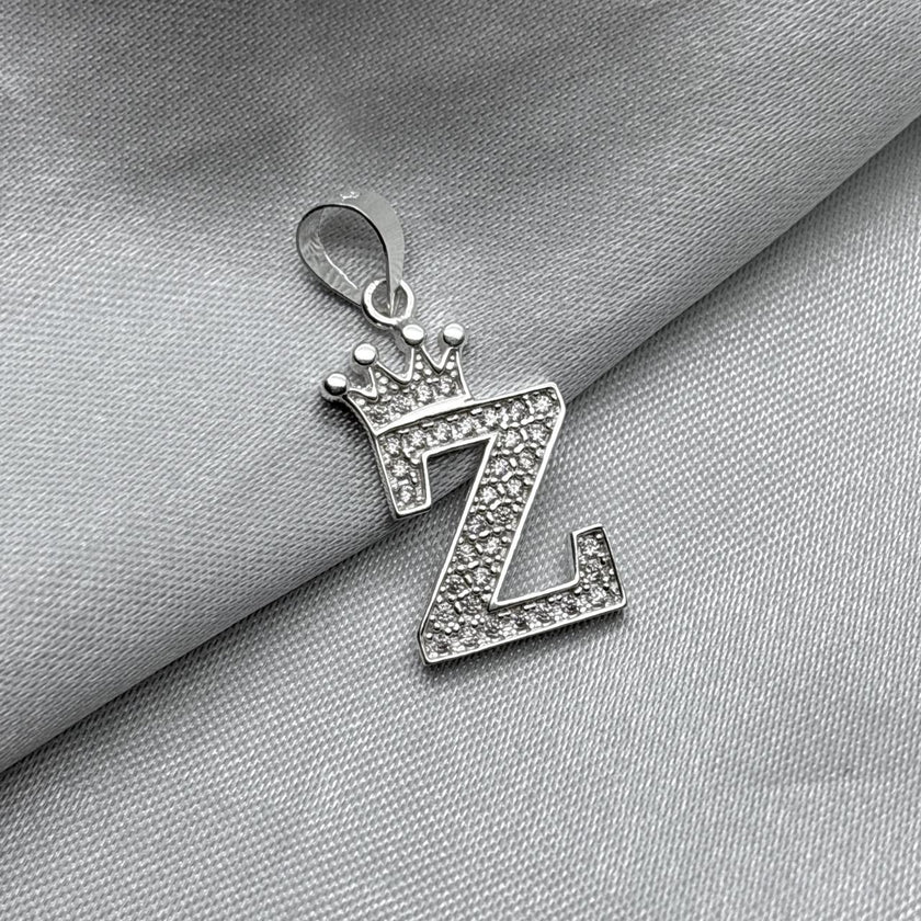 #D593 - Dije Letras Con Corona Y Piedra Zirconia Plata - ZC2.5