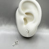 #BR319 - Broquel Flor Con Piedra Zirconia Plata